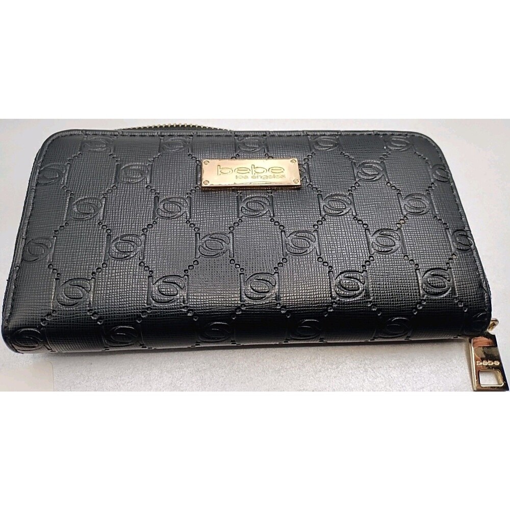 Bebe Alana zip-around wallet, featuring a black embossed geometric logo pattern